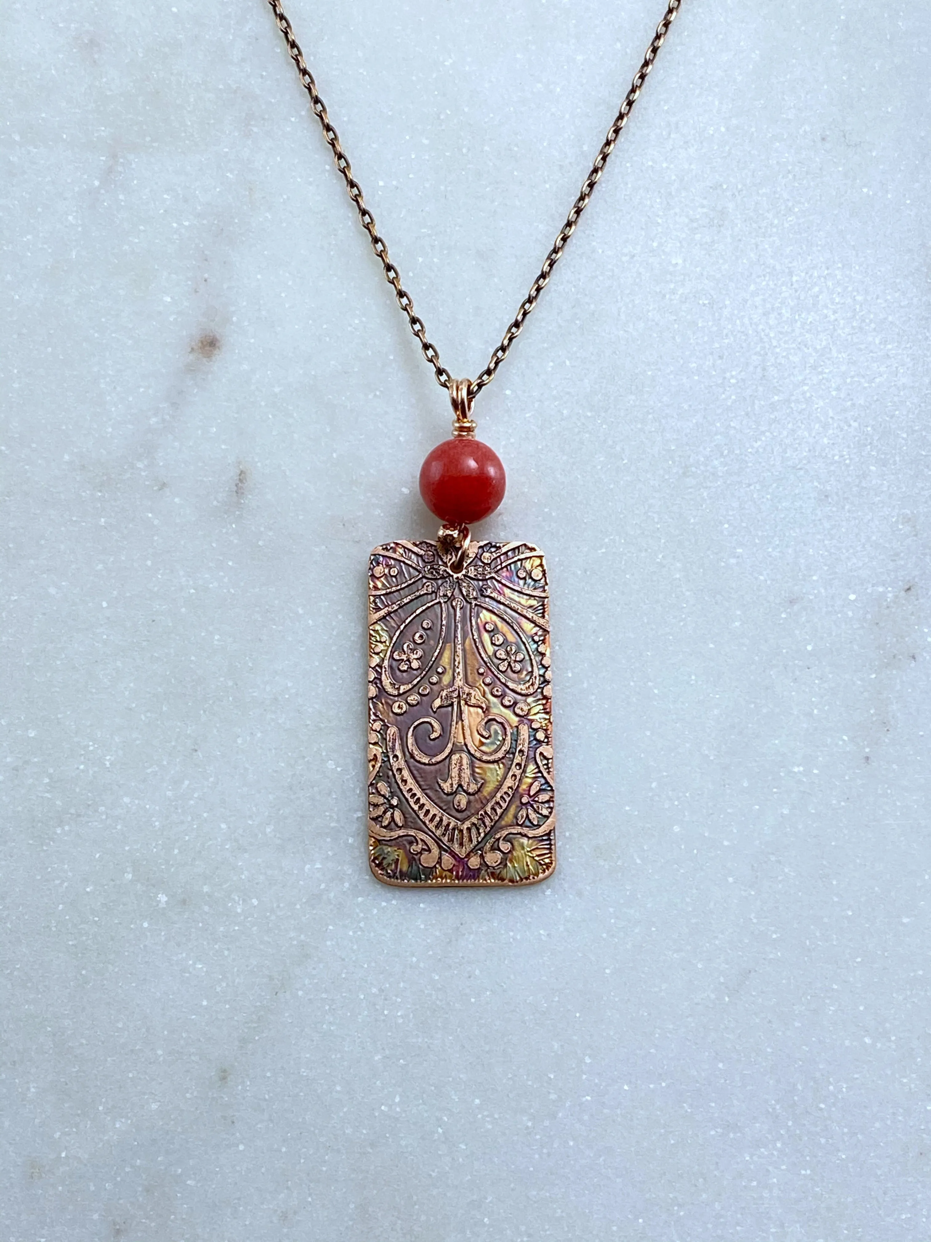 Acid etched copper mandala necklace with coral