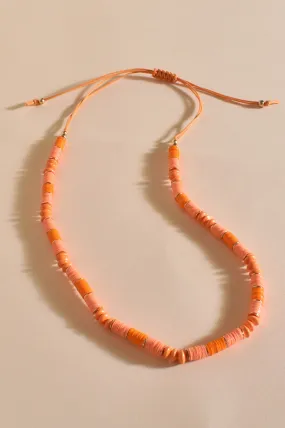 Bead Patterned Cord Back Necklace in Coral