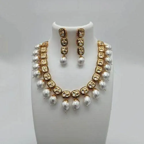 Cut Work Oval Kundan Necklace And Earring Set