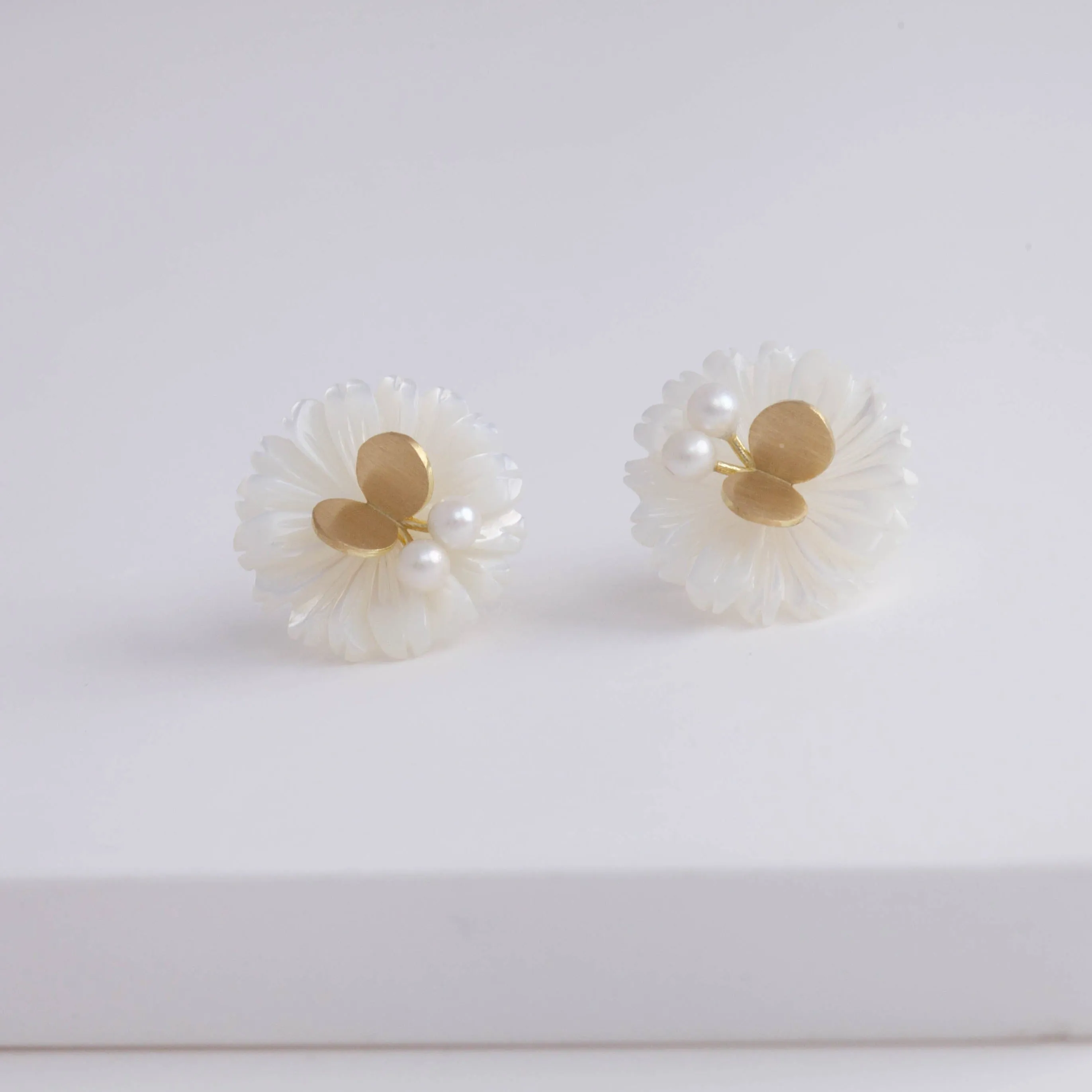 Daisy pearl butterfly earrings