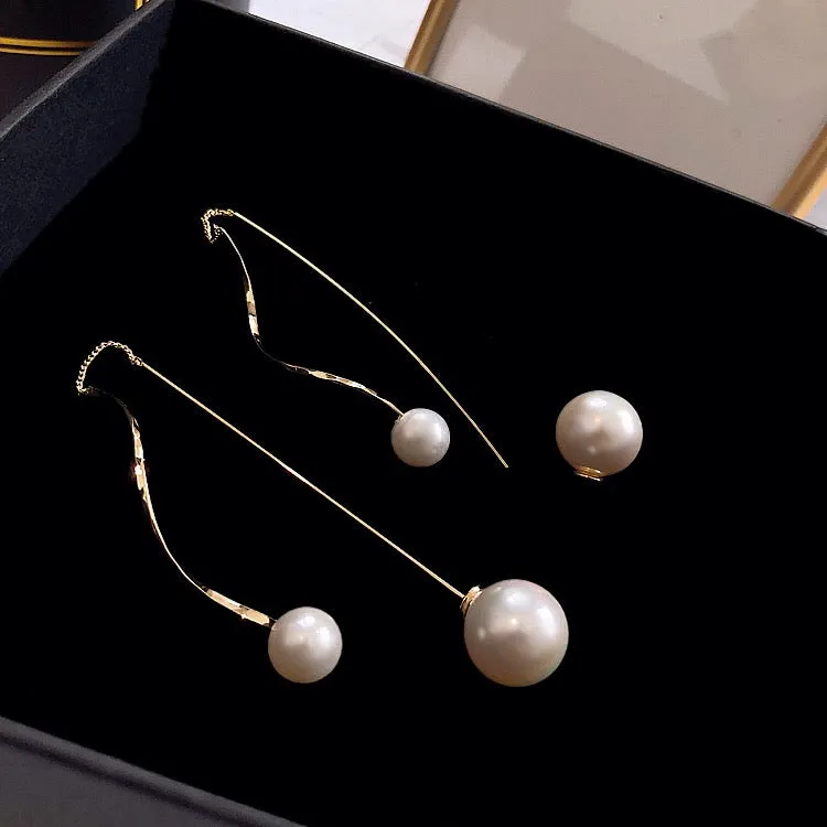 E208 pearls wire drop earrings