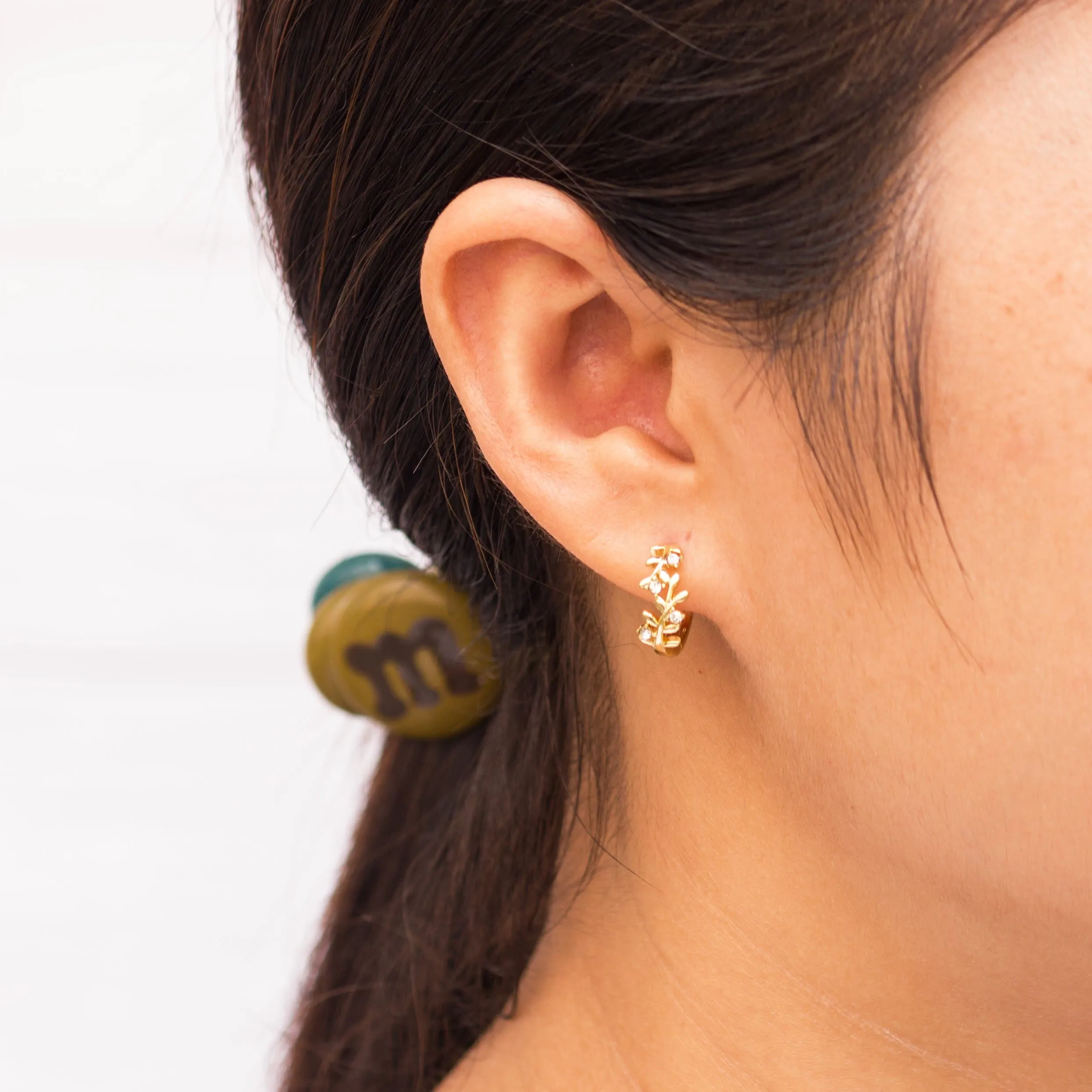 Gold Plated Leaf Hoop Earrings Created with Zircondia® Crystals