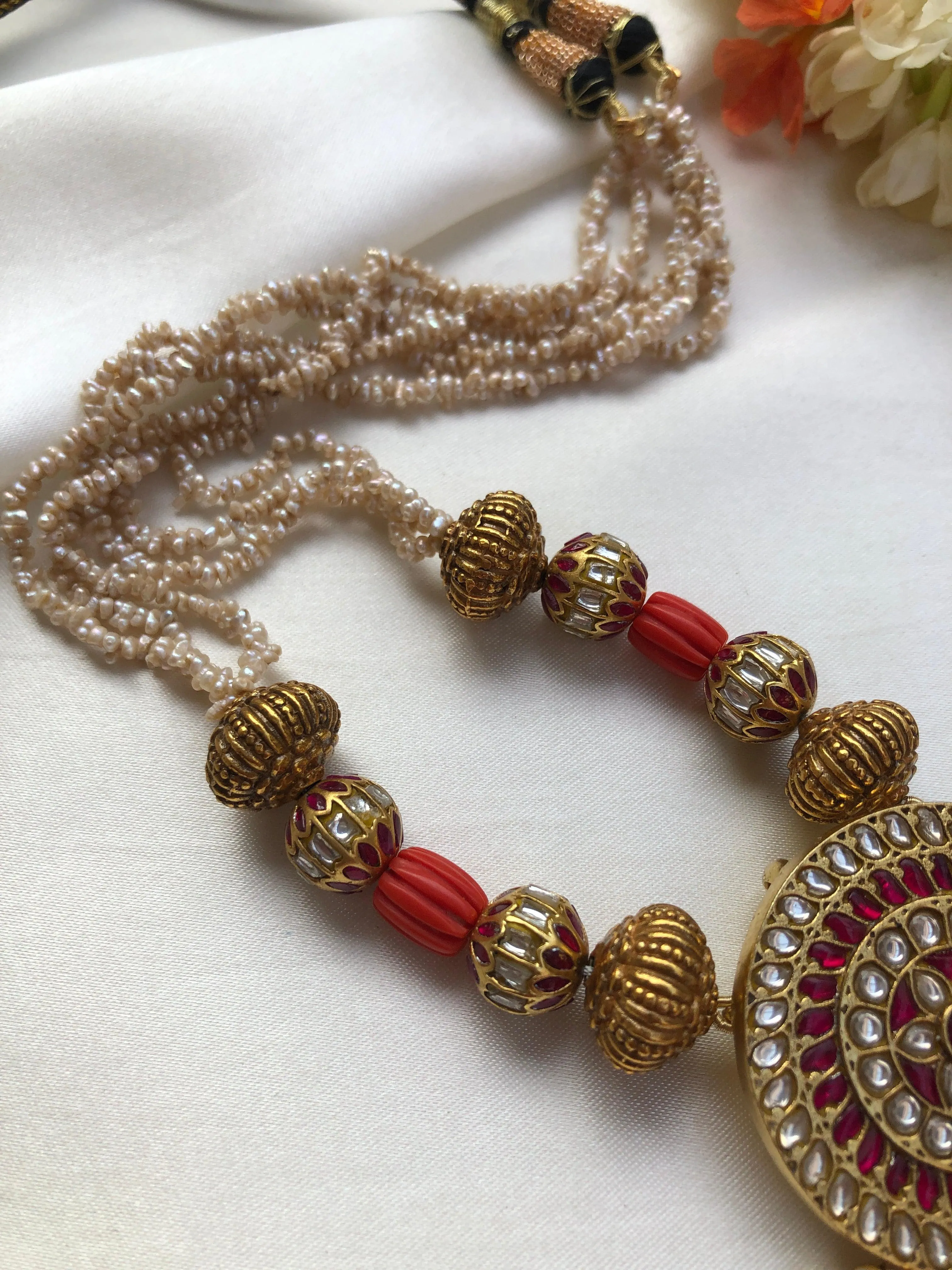 Kundan ruby pendant with antique beads, pearls & coral necklace