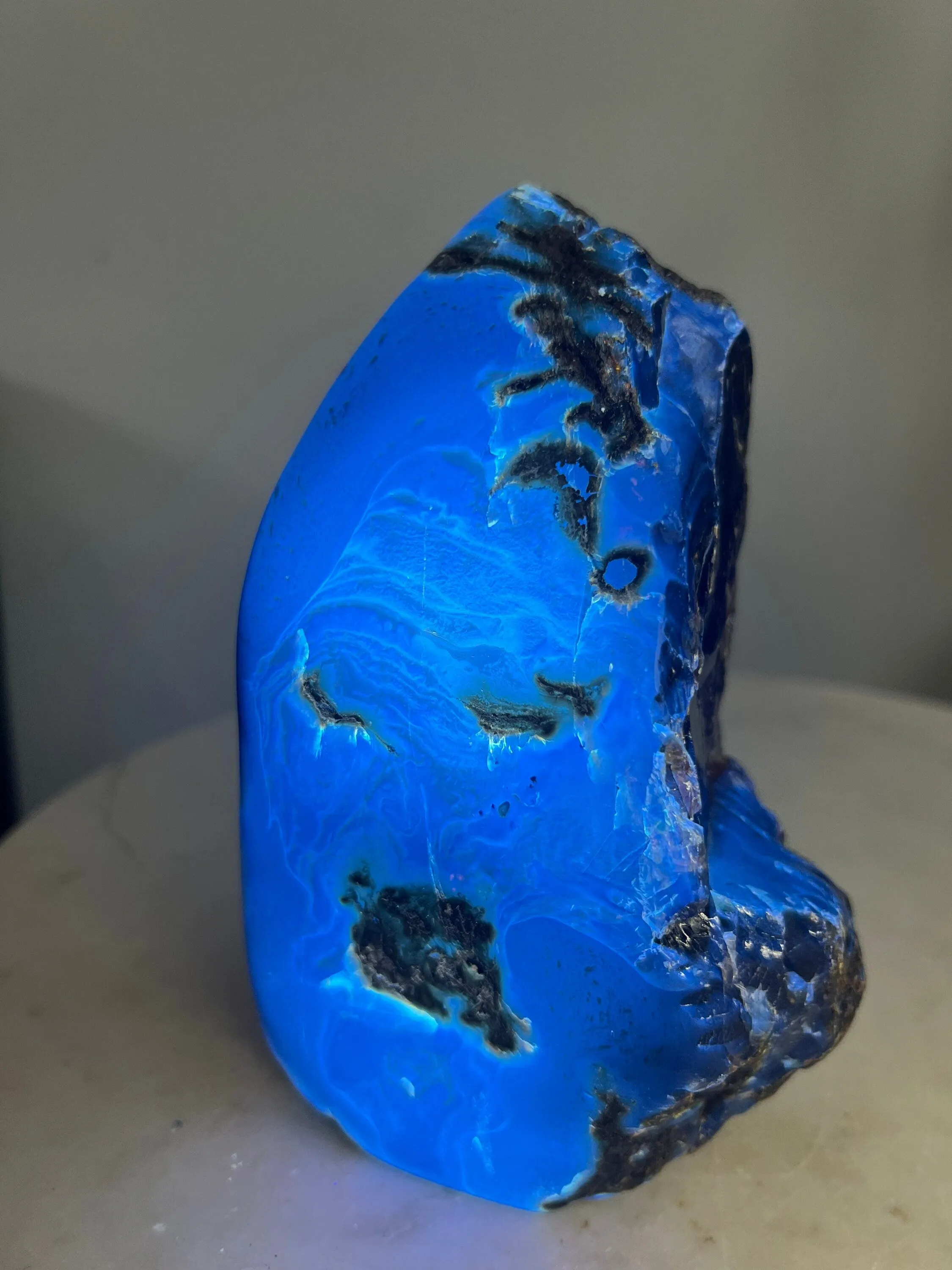 Natural Sumatran Blue Amber, freeform UV REACTIVE BLUE Half polished 502grams.