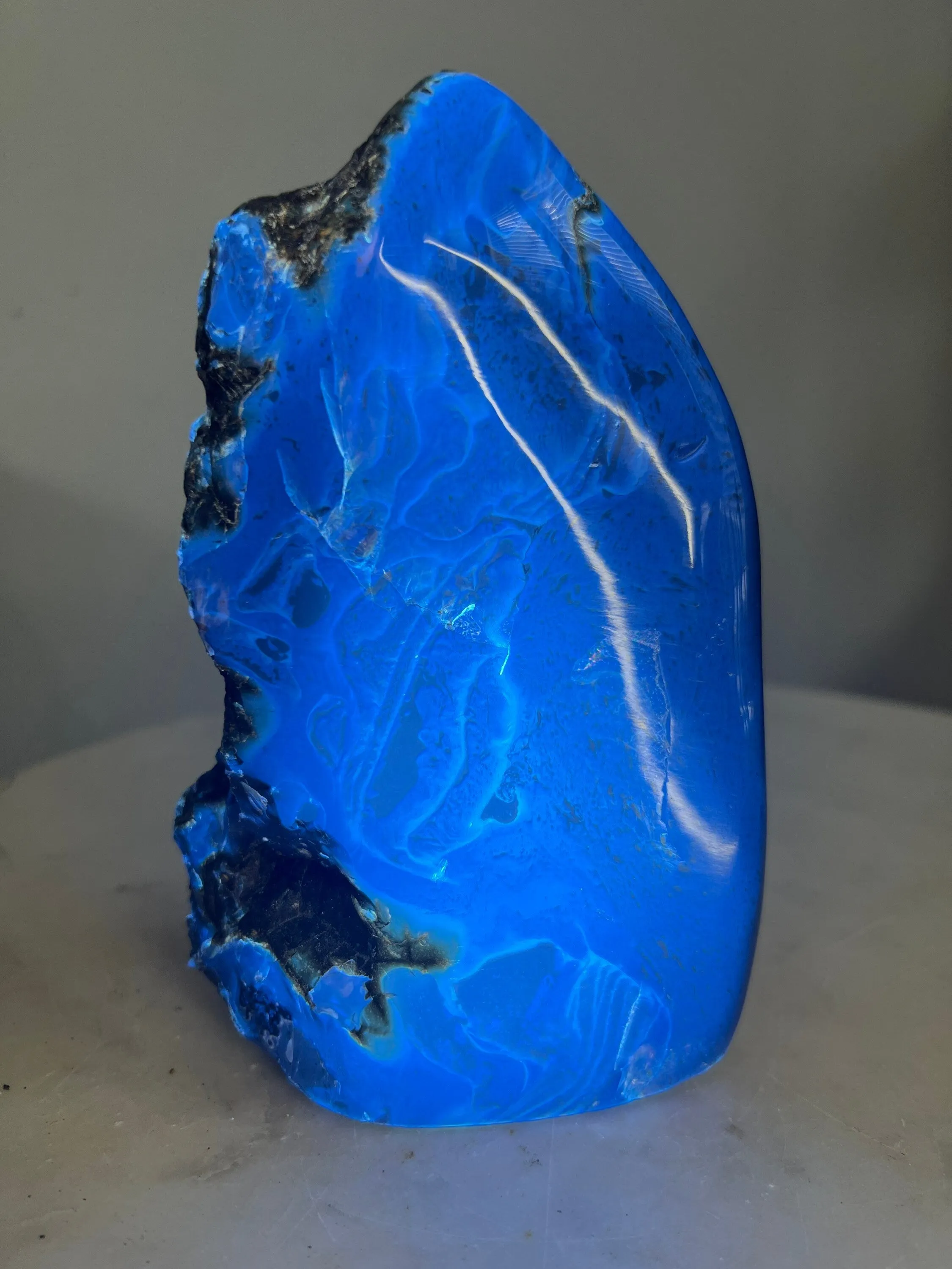 Natural Sumatran Blue Amber, freeform UV REACTIVE BLUE Half polished 502grams.