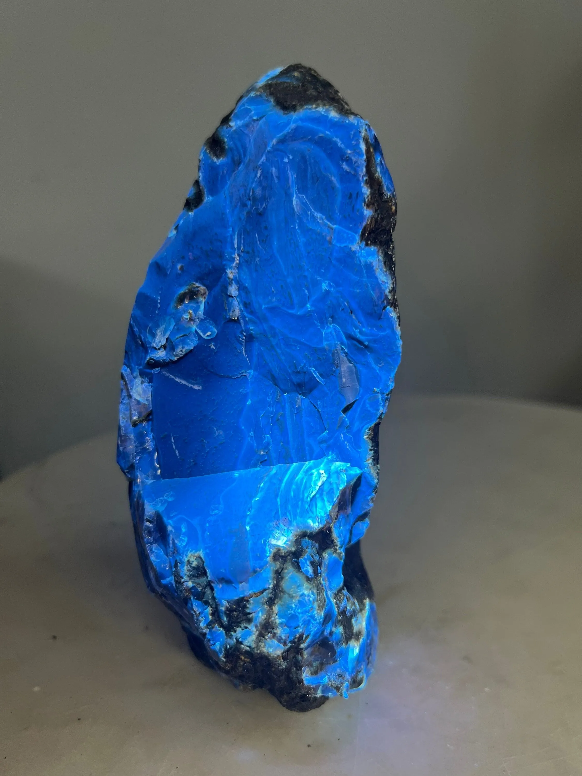 Natural Sumatran Blue Amber, freeform UV REACTIVE BLUE Half polished 502grams.