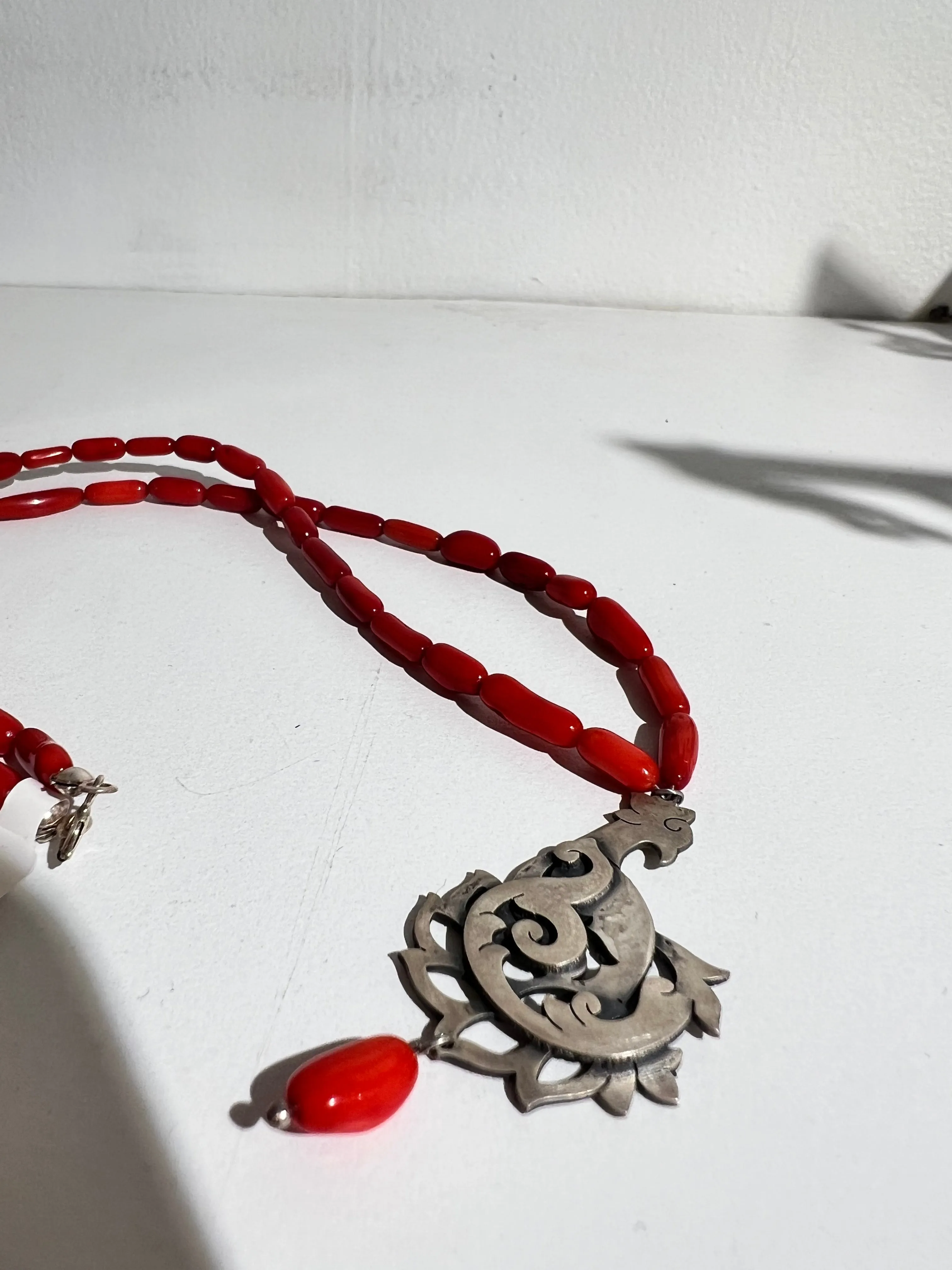 Silver/Coral abstract bird Necklace